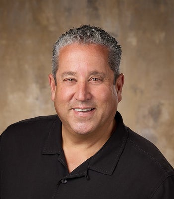 Portrait of Marcello Conigliaro, Realtor®,  Designated Broker, GRI,  CRS, CNE, ABR  .